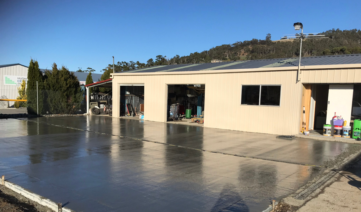 Concrete slab at rear of workshop ready for extention.